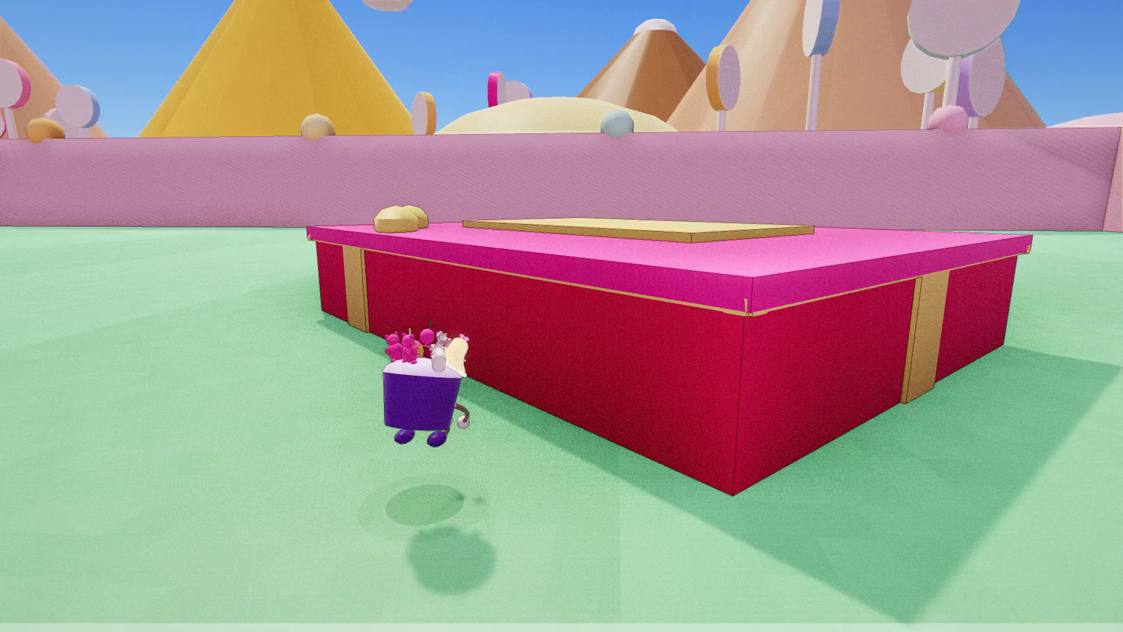 A Cupcake carrying a stack of candy past a gift box in the garden